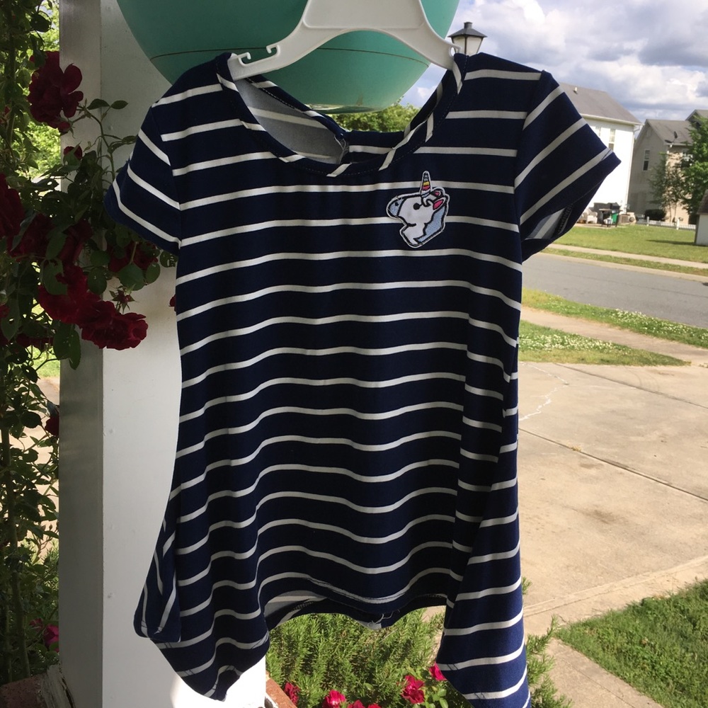Stripped top with unicorn patch